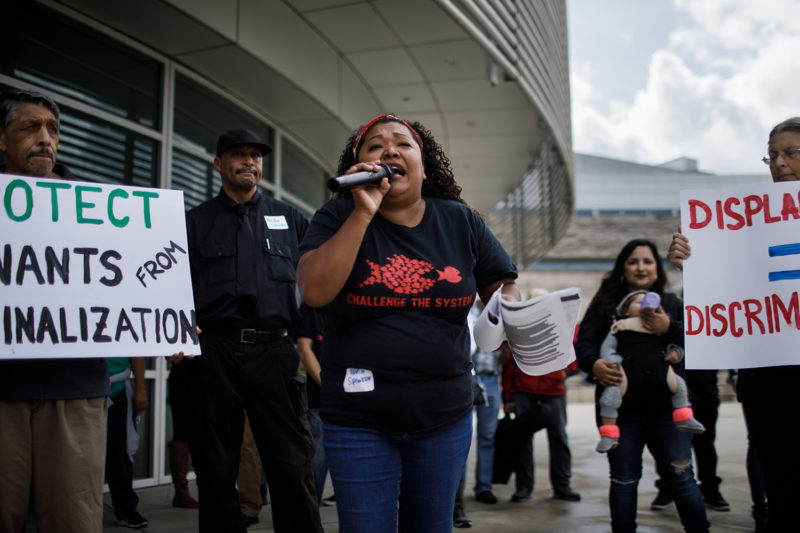 Community organizer Olivia Ortiz speaks during a rally at San Jose City Hall to support tenants’ rights and affordable housing in her Mayfair neighborhood on Aug. 16, 2019, in San Jose, Calif. “Politicians have to think about us, who work in the restaurants and as janitors,” she said.