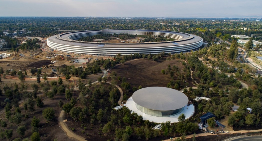 The Steve Jobs Theater, foreground, in the Apple Park campus in Cupertino, California, on Thursday, September 7, 2017. (LiPo Ching/Staff Archives)