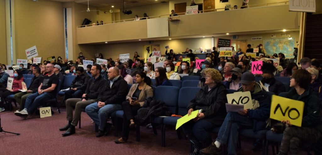 Dozens of residents gathered at Mission City Church in Santa Clara on March 9, 2023, most of whom opposed a proposed homeless housing site on Benton Street and Lawrence Expressway.